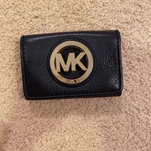 Michael Kors card wallet. Leather black with gold